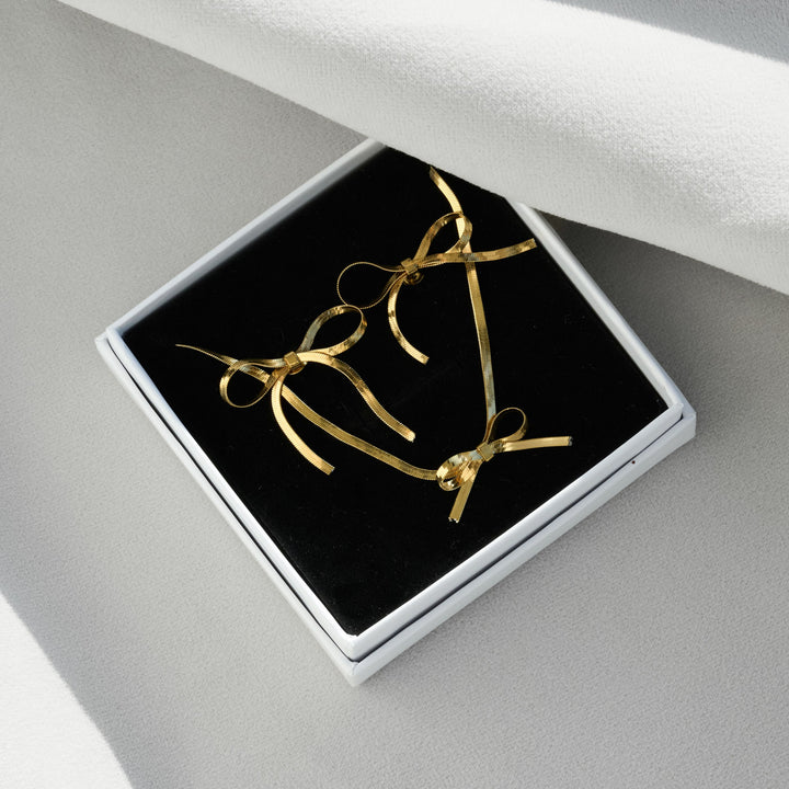 Conjunto de regalo de collar y pendientes con cadena de serpiente y lazo