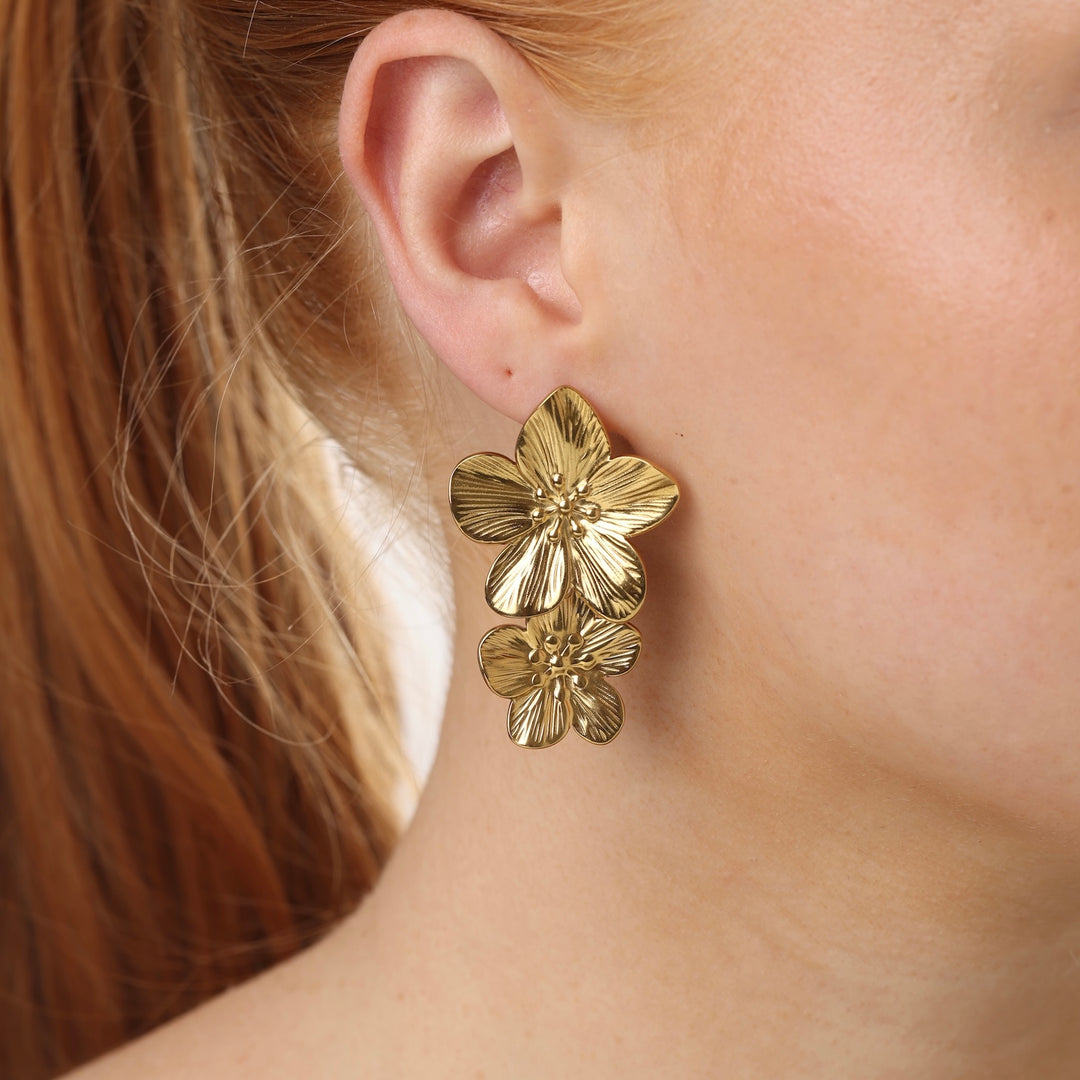 Lottie - Pendientes de flor de acero inoxidable